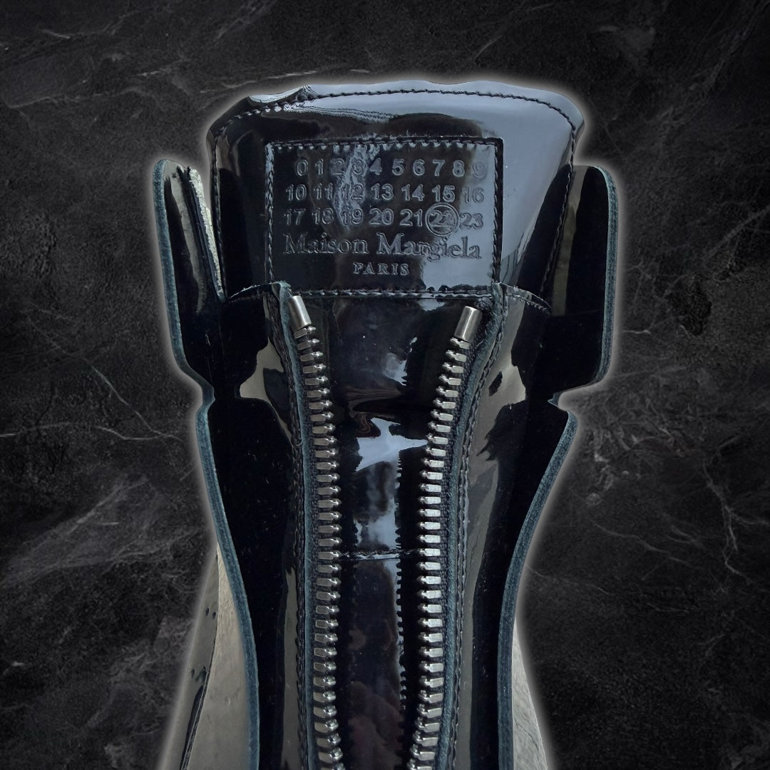 Maison Margiela “Circuit” patent leather high-top sneakers (Black)