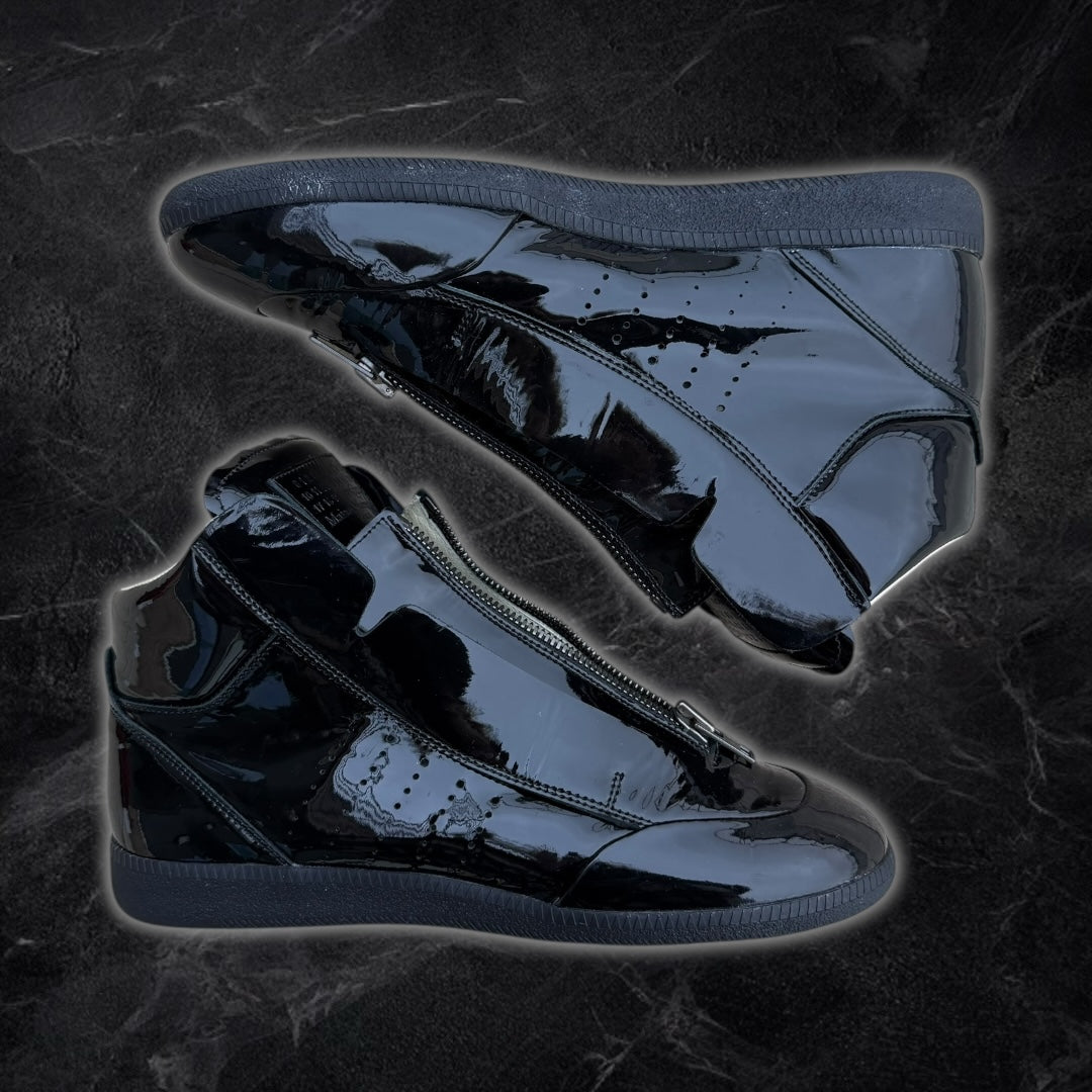 Maison Margiela “Circuit” patent leather high-top sneakers (Black)