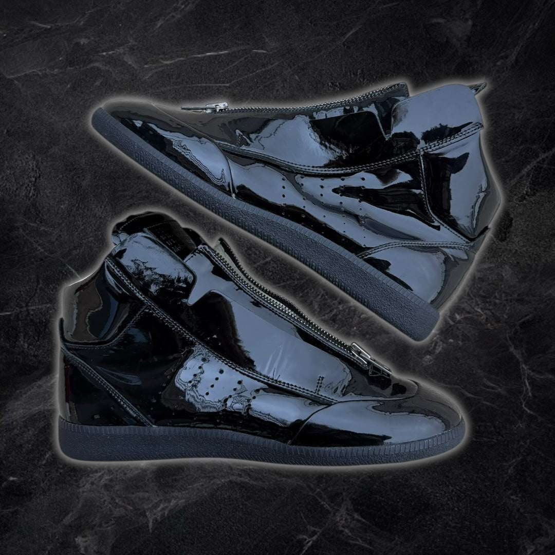 Maison Margiela “Circuit” patent leather high-top sneakers (Black)