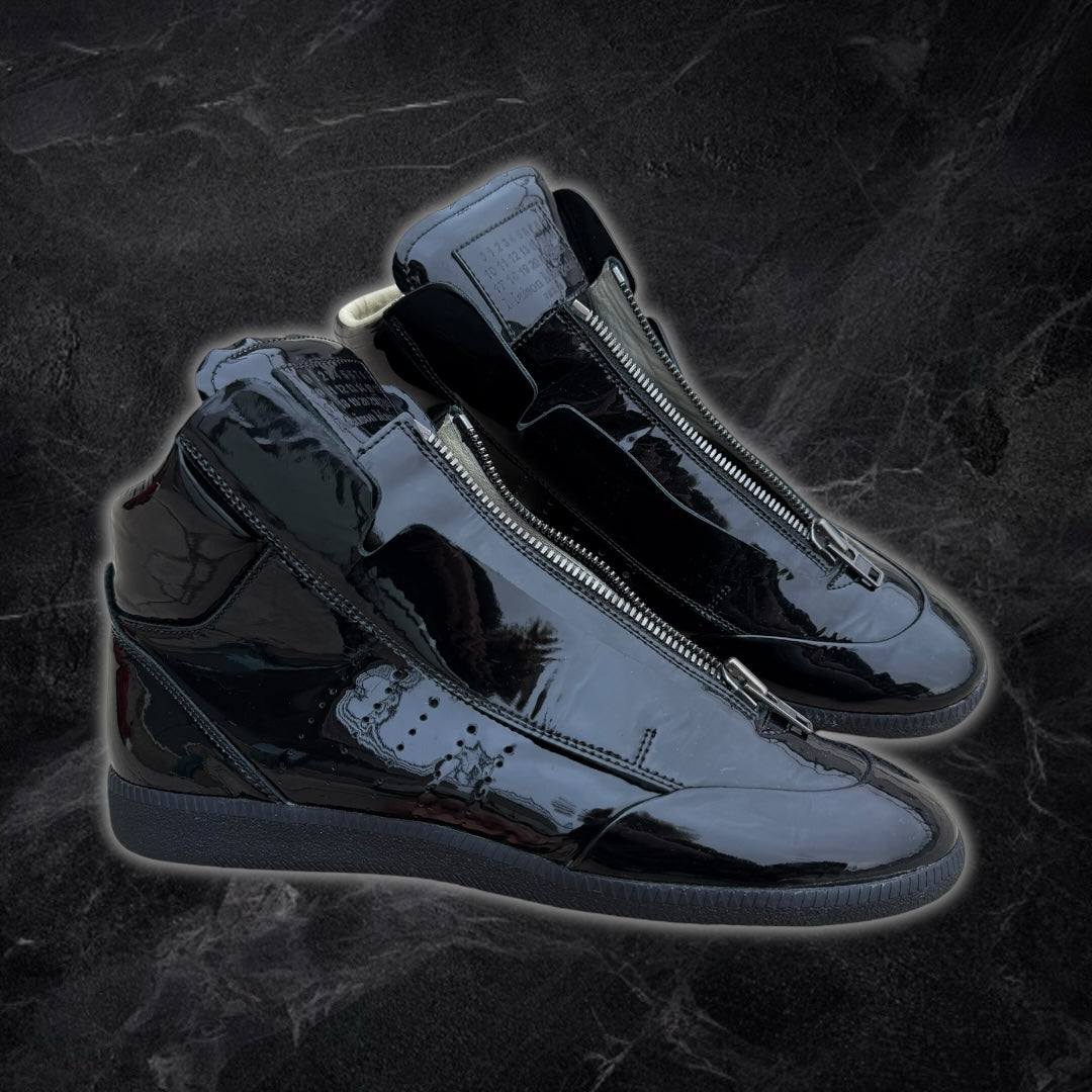 Maison Margiela “Circuit” patent leather high-top sneakers (Black)
