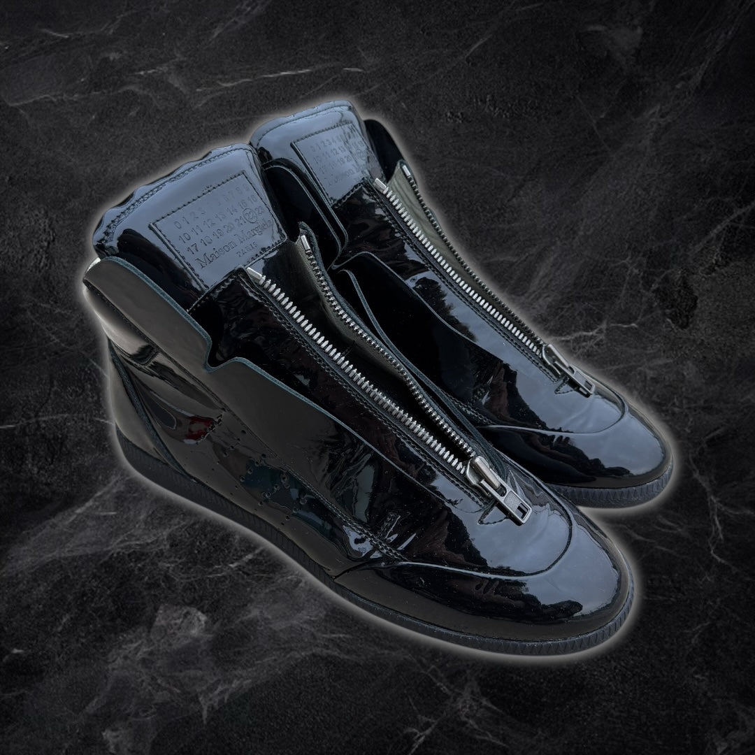 Maison Margiela “Circuit” patent leather high-top sneakers (Black)