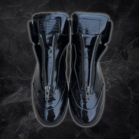 Maison Margiela “Circuit” patent leather high-top sneakers (Black)